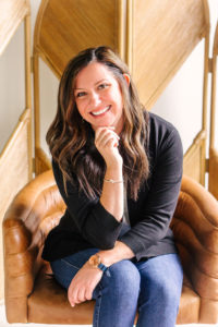 headshot of woman in black shirt dianna robicheau